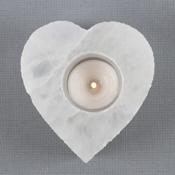 Selentie heart t light with lit candle